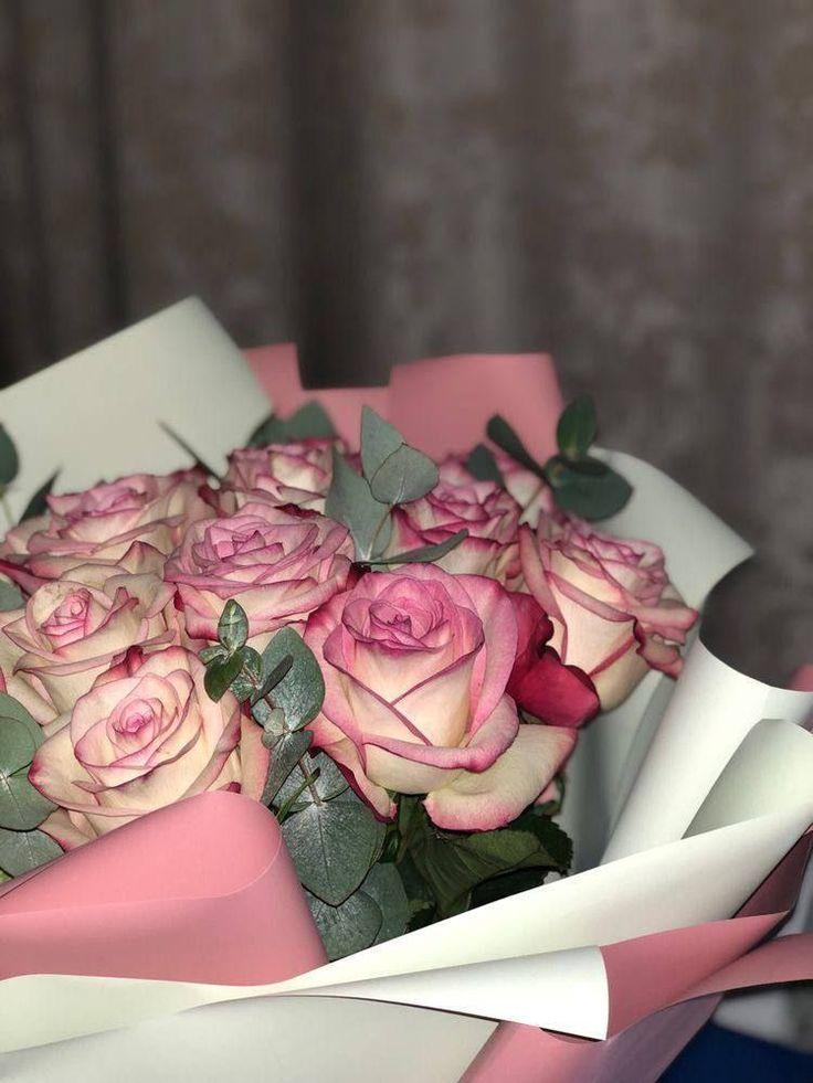 Professional floral arrangement in modern corporate setting